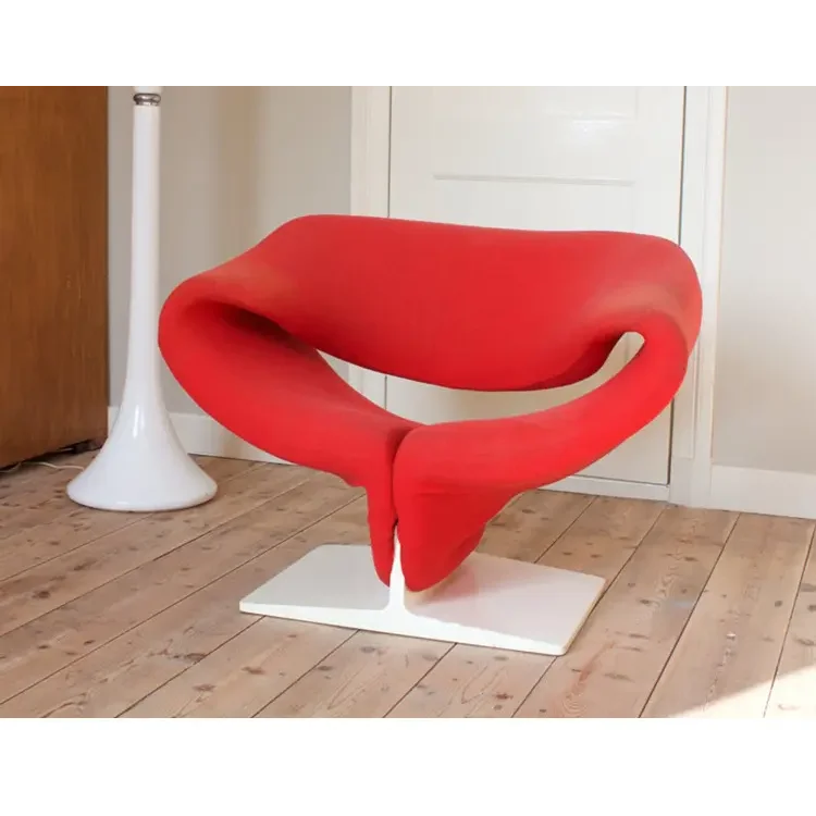 Modern Sculptural Accent Chair and Ottoman | Luxury Interiors