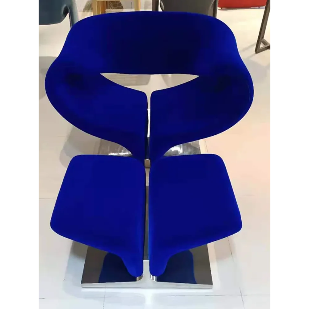 Modern Sculptural Accent Chair and Ottoman | Luxury Interiors