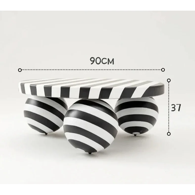 Striped Coffee Table with Artistic Ball Legs – Modern Optical Design | Interior
