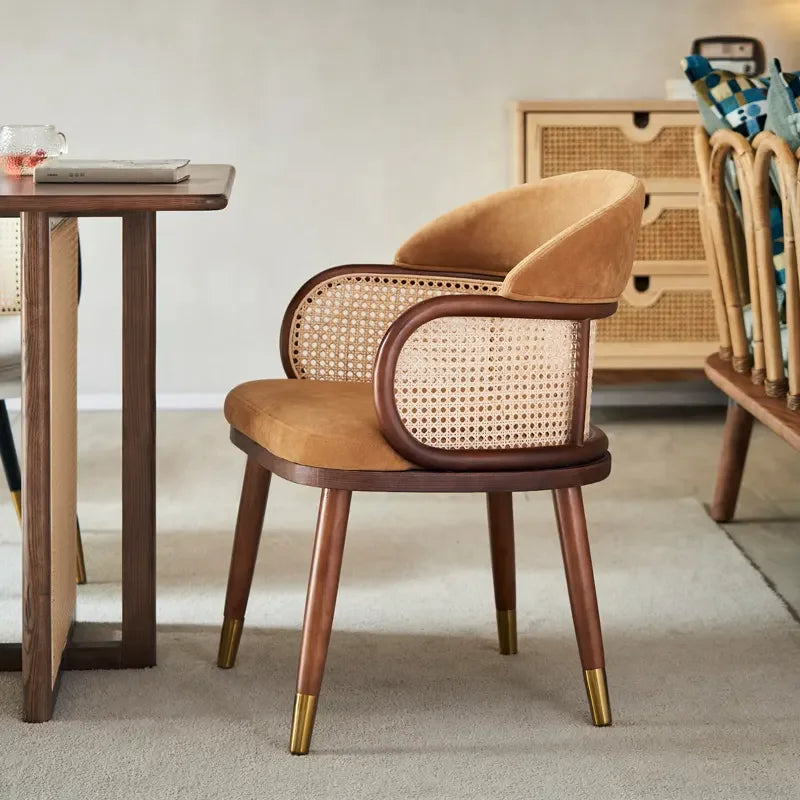 Designer Cane Dining Chair – Velvet Upholstery with Rattan Backrest and Gold-tipped legs | Luxury Interiors