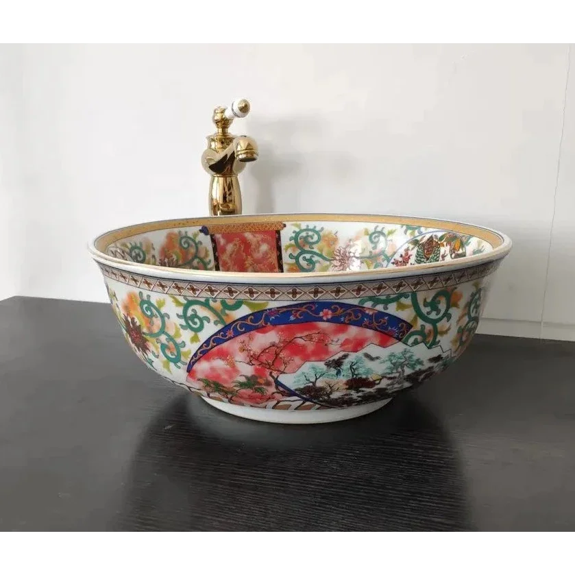 Artisan Hand-painted Ceramic Basin with Ornate Gold Faucet