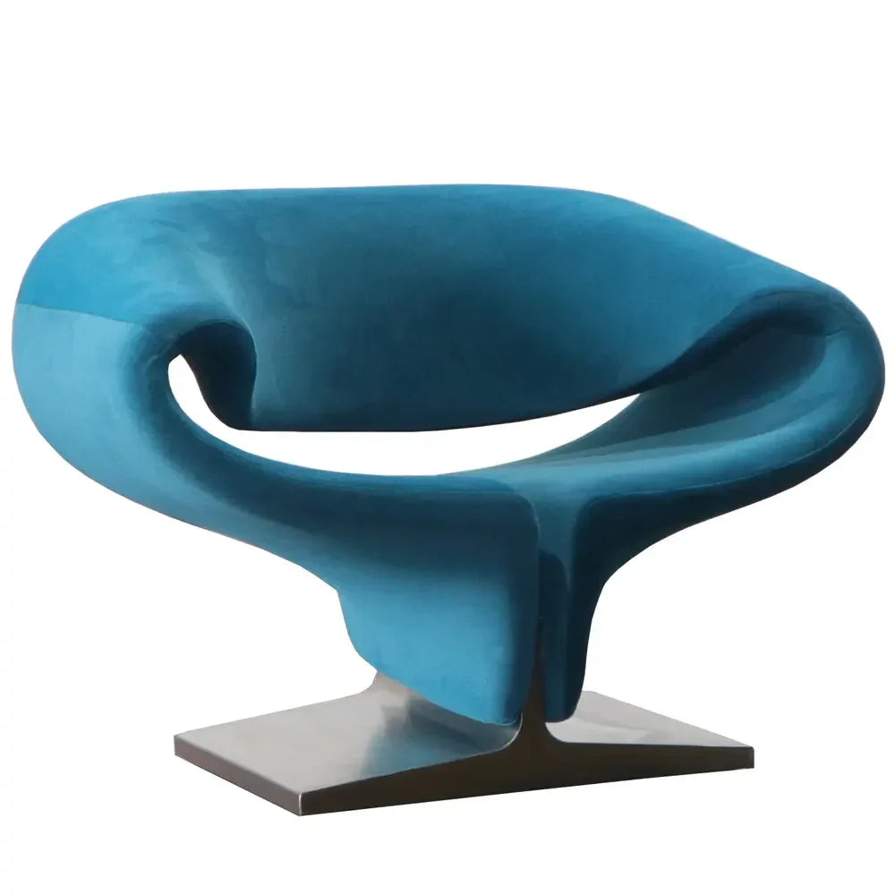 Modern Sculptural Accent Chair and Ottoman | Luxury Interiors