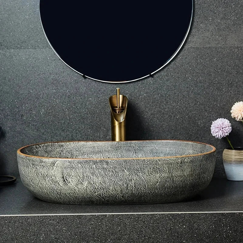 Modern Textured Stone Vessel Sink with Subtle Gold Accents | Luxury Bathroom