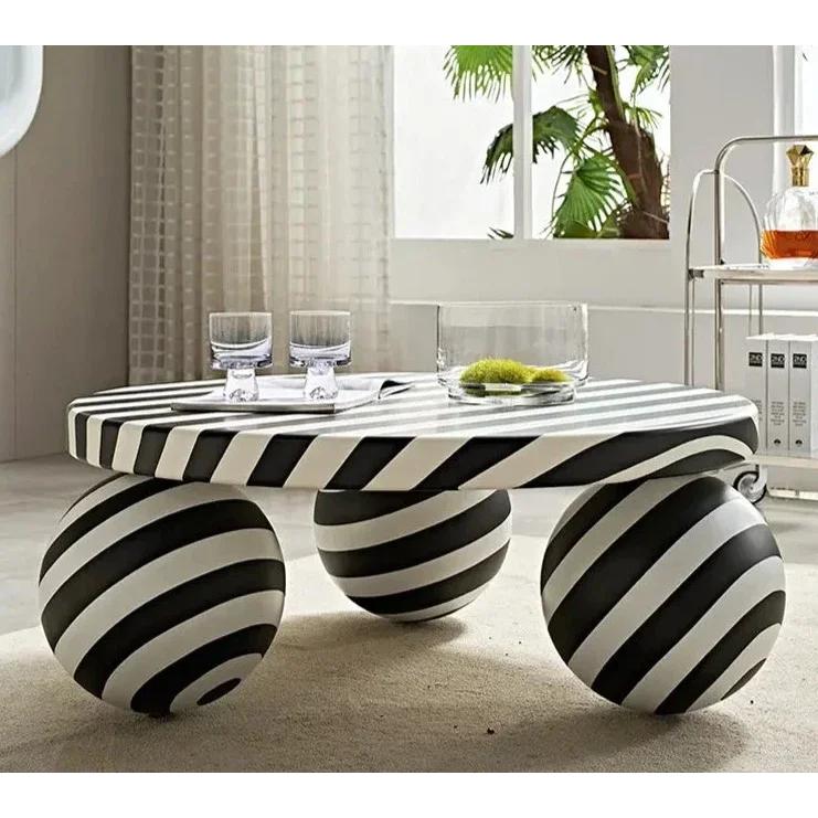 Striped Coffee Table with Artistic Ball Legs – Modern Optical Design | Interior